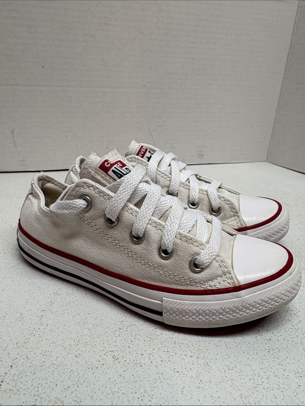 Converse White Low-Top Sneakers with Red Stripe